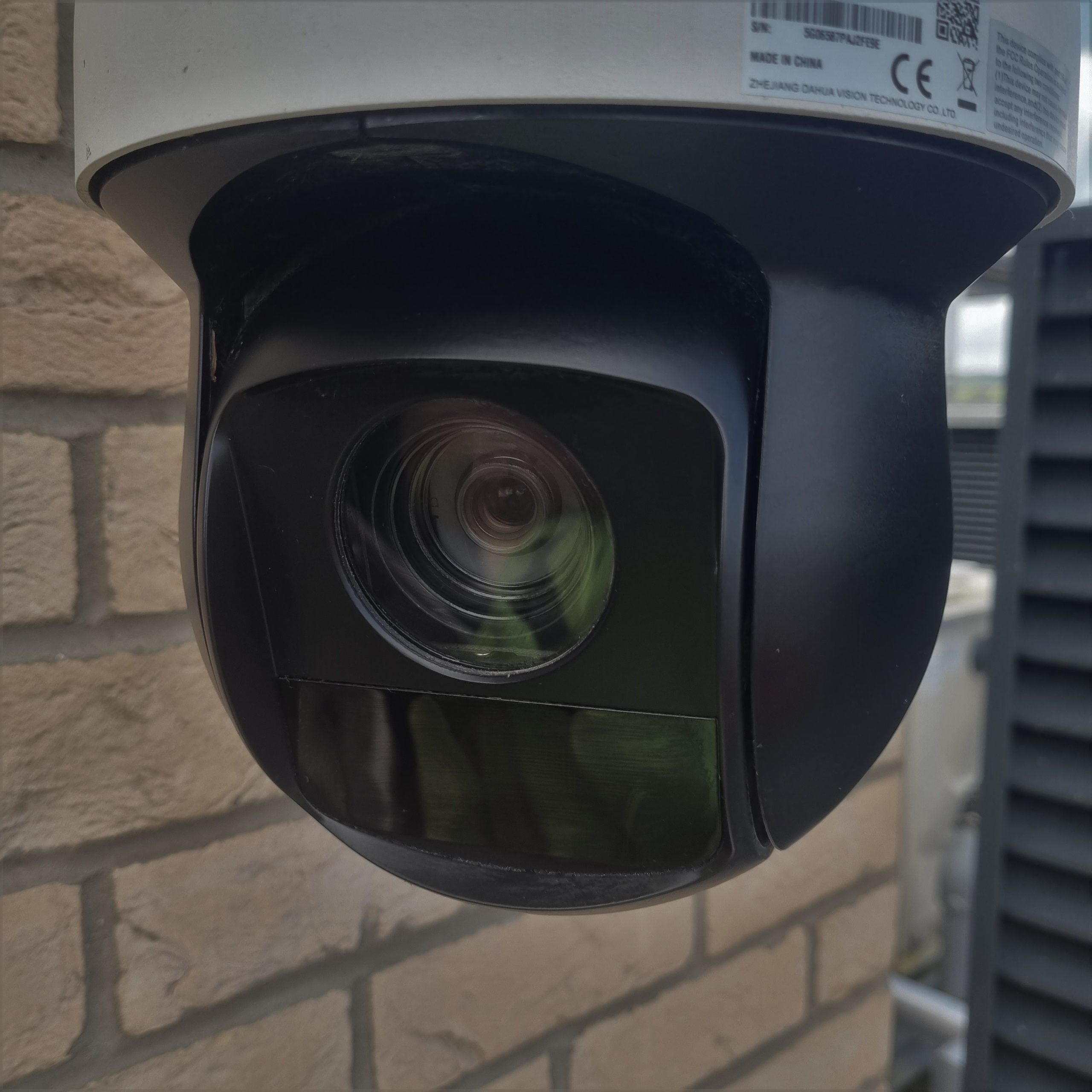 Image of a CCTV camera that is mounted on a wall