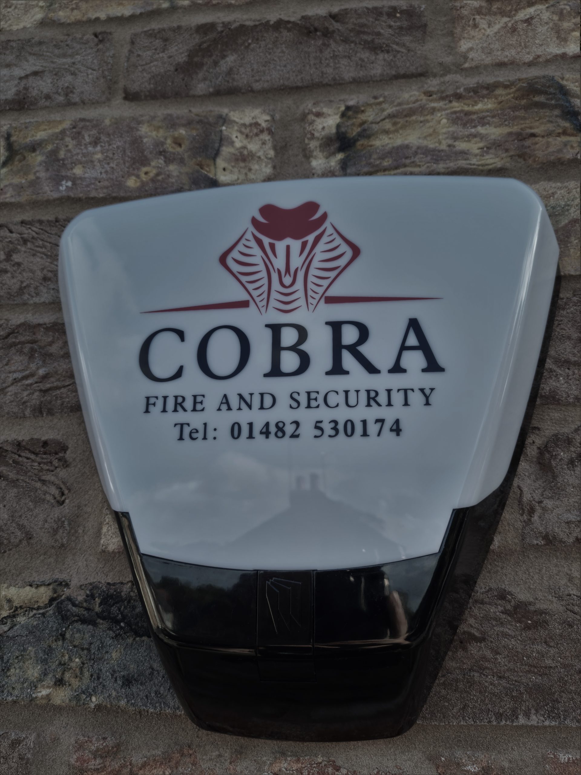 A bellbox for an Intruder Alarm system with Cobra fire and security's logo