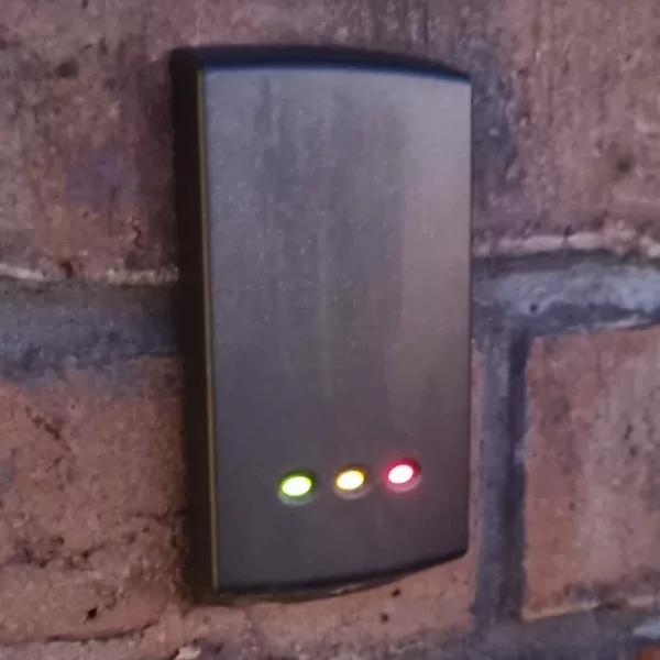 Access control fob reader with 3 lights. Yellow, orange and red at the bottom of the reader