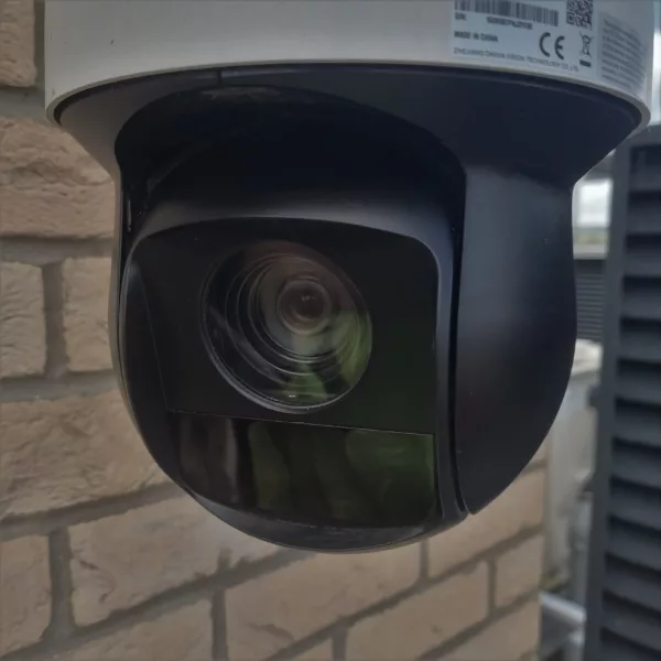 Image of a CCTV camera that is mounted on a wall