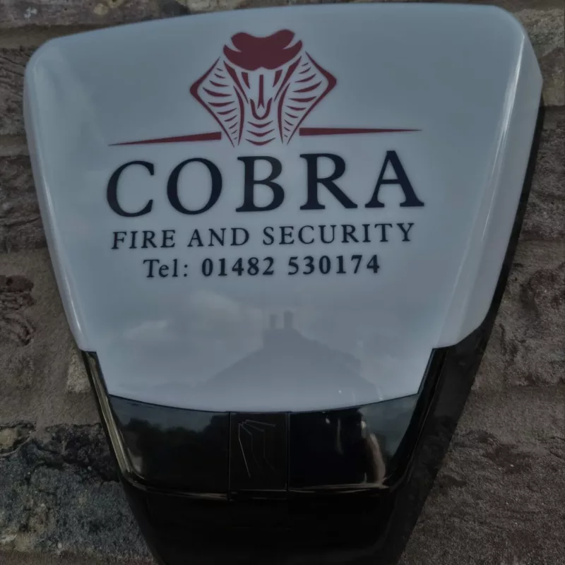 A bellbox for an Intruder Alarm system with Cobra fire and security's logo