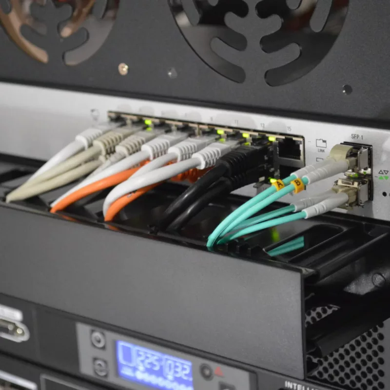 IT Equipment located in a server rack, along with cabling as part of a structured network